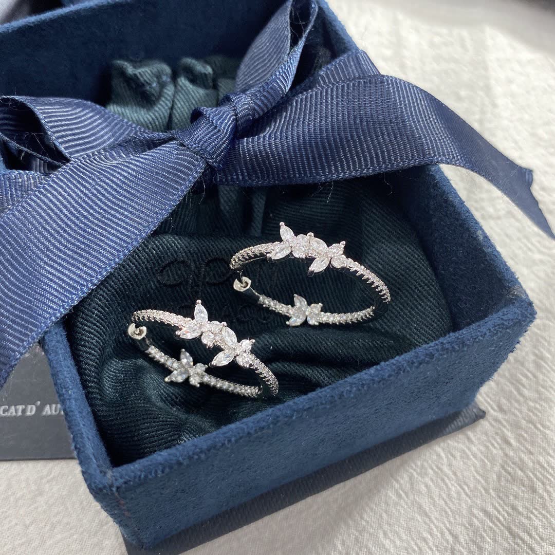 APM Monaco Silver Hoop Earrings with Butterfly Design